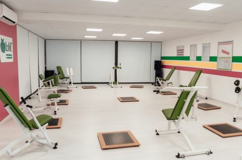 Bright and spacious gym interior featuring modern green exercise machines in Yalova.